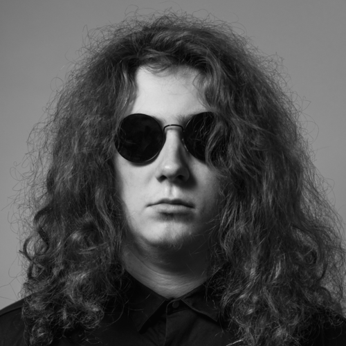 Leonid Vasilev with glasses